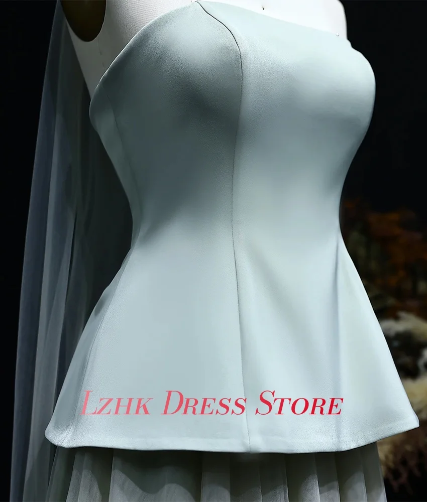 Abito da sera con nastri a trapezio in organza grazioso personalizzato Abiti da cerimonia su misura senza maniche senza spalline di alta qualità