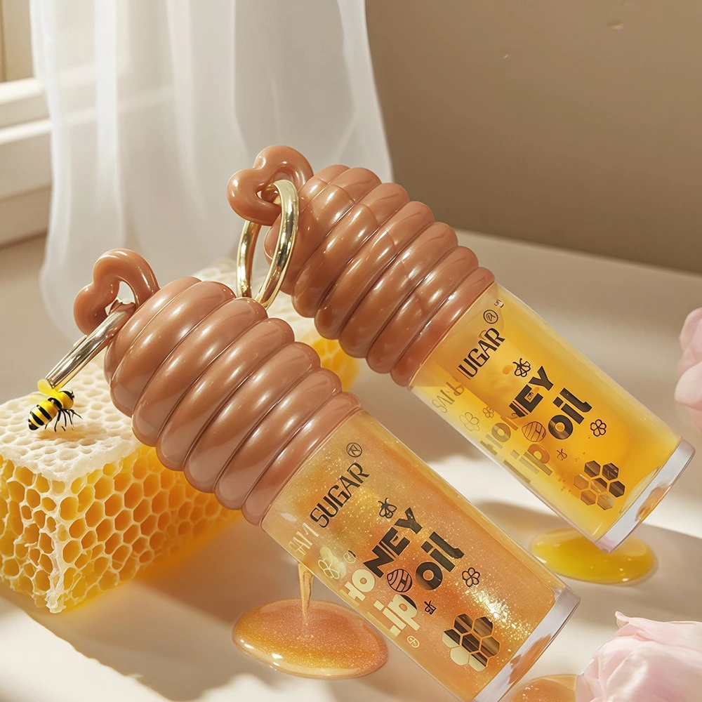 ハニーインフューズドリップオイル プランピンググロス 長時間保湿 リップケアトリートメント 乾燥した唇用 活性化フォーミュラ配合 キーホルダー付き