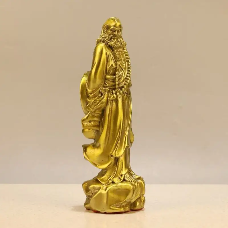 Brass - Master Daruma Standing On A Reed Crossing The River Feng Shui Ornament