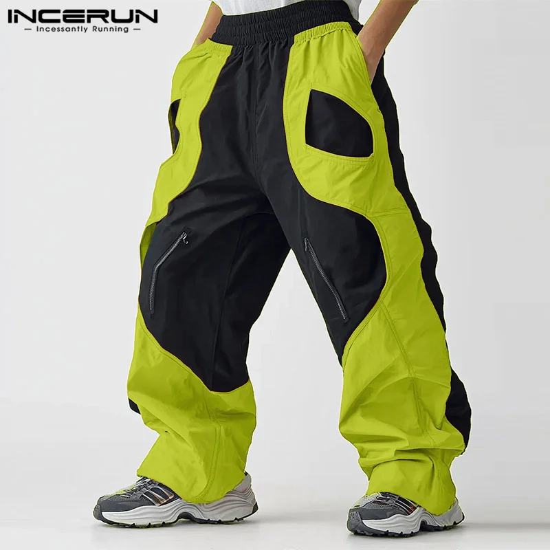 INCERUN เสื้อกันหนาวเอวยางยืดกระเป๋าซิปหลวมด้านล่างผู้ชาย Colorblock กางเกงแฟชั่น 2024 สบายๆสไตล์อเมริกันกางเกง