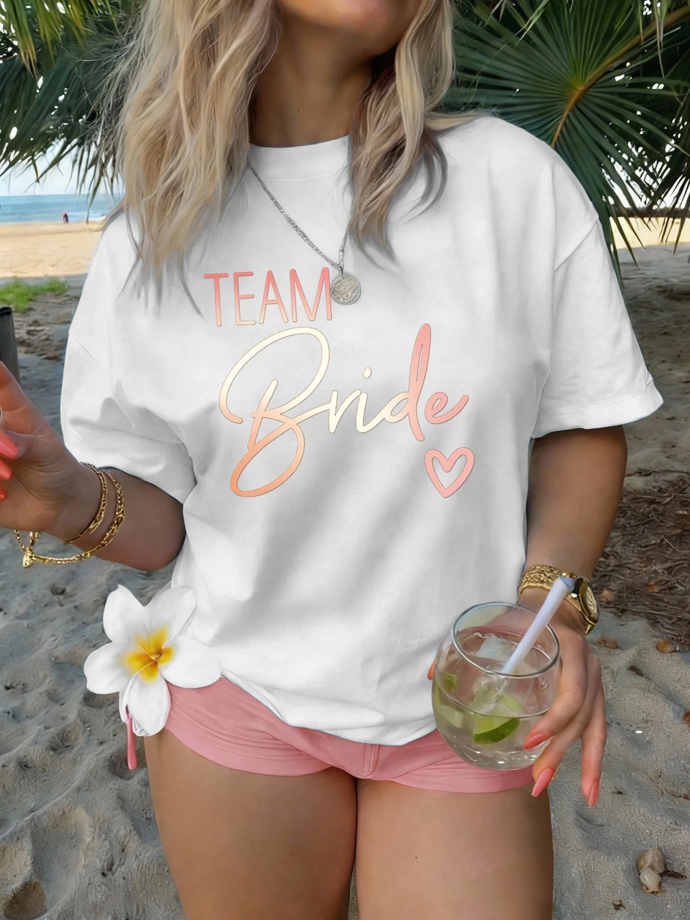 T-shirt à manches courtes et col rond pour femme, facile d'entretien, style décontracté avec les mots « TEAM Bride » et un motif cœur