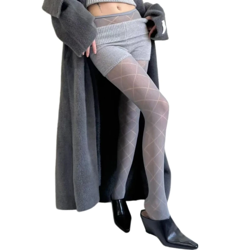 جوارب نسائية حلوة من شبكة صيد السمك جوارب شبه شفافة جوارب أنيقة مجوفة من قماش الجاكار بلون واحد جوارب طويلة ضيقة