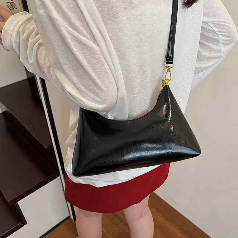 

Modern Architectural Structured Bag For Women With Geometric Lines And Premium Leather Material