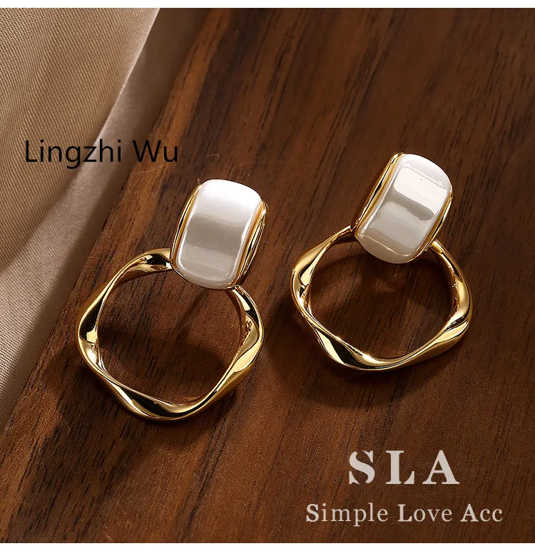 

Lingzhi Wu Unique White Matte Circle Silver Earrings Female New Arrival