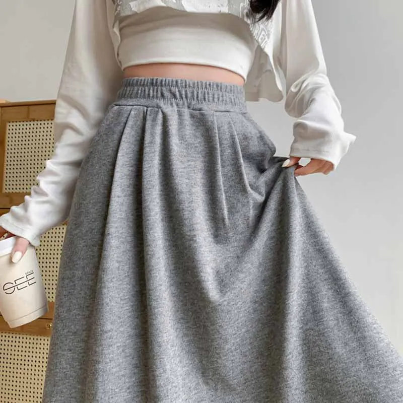 Cor sólida casual com bolsos a linha saias femininas coreano emagrecimento elástico de cintura alta saia longa mulher versátil midi saias