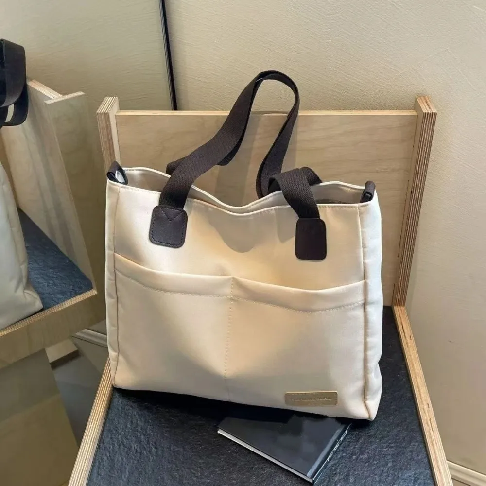 

Stylish Portable Multi-Pocket Tote Bag with Shoulder Strap Thickened Travel Shoulder Bag Simple Polyester Work Bag Commuting