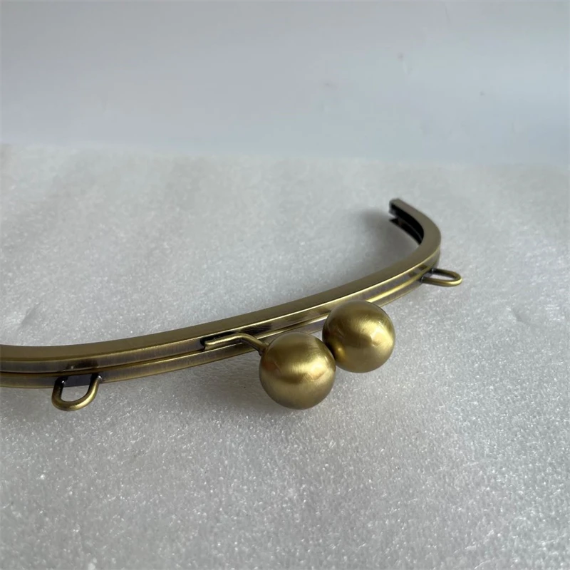 26.0*10.0cm Antique Brass Big Ball Claps Screws With Loops Metal Purse Frame Wholesale Handbag Accessories Obag Parts Handles