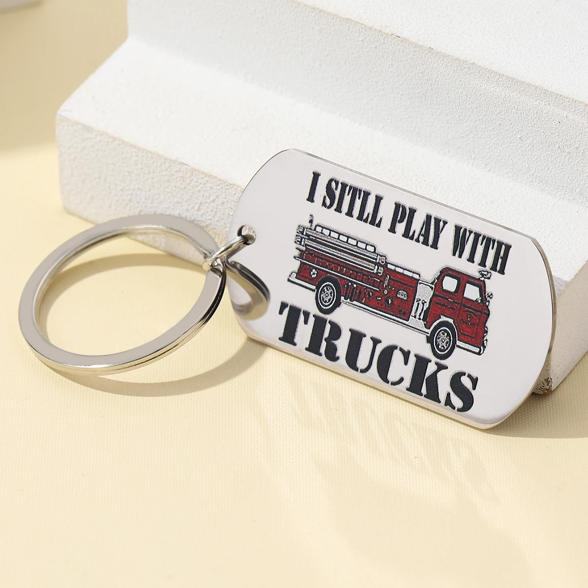 1Pc Fun Firefighter I Still Play With Fire Trucks stainless steel colored keychain as a wonderful gift for firefighters