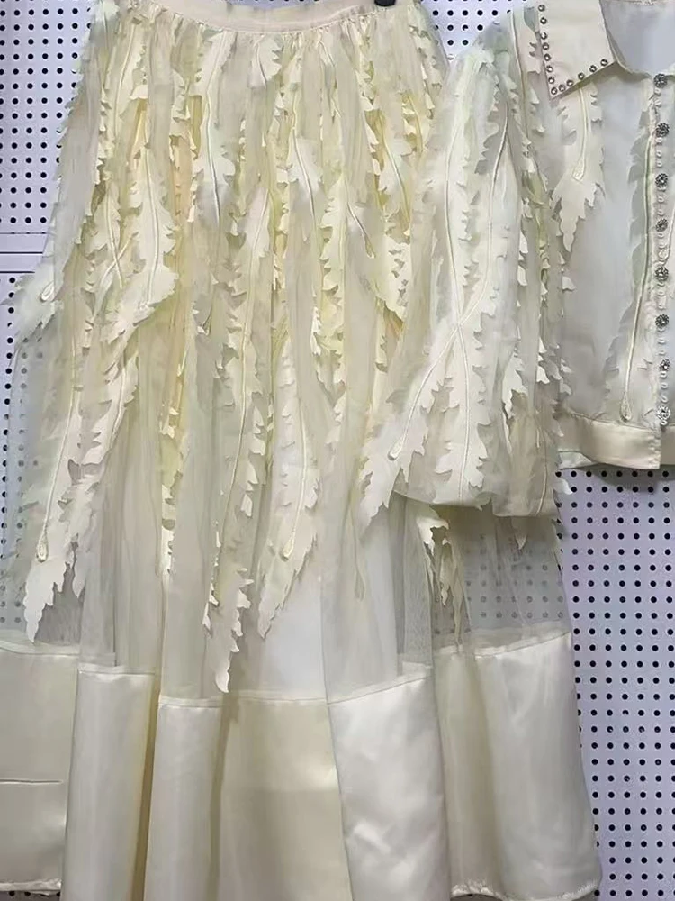 Camicia monopetto a maniche corte con trapano per unghie pesanti 2025 estate nuova + gonna con frange a vita alta abito da donna in due pezzi moda