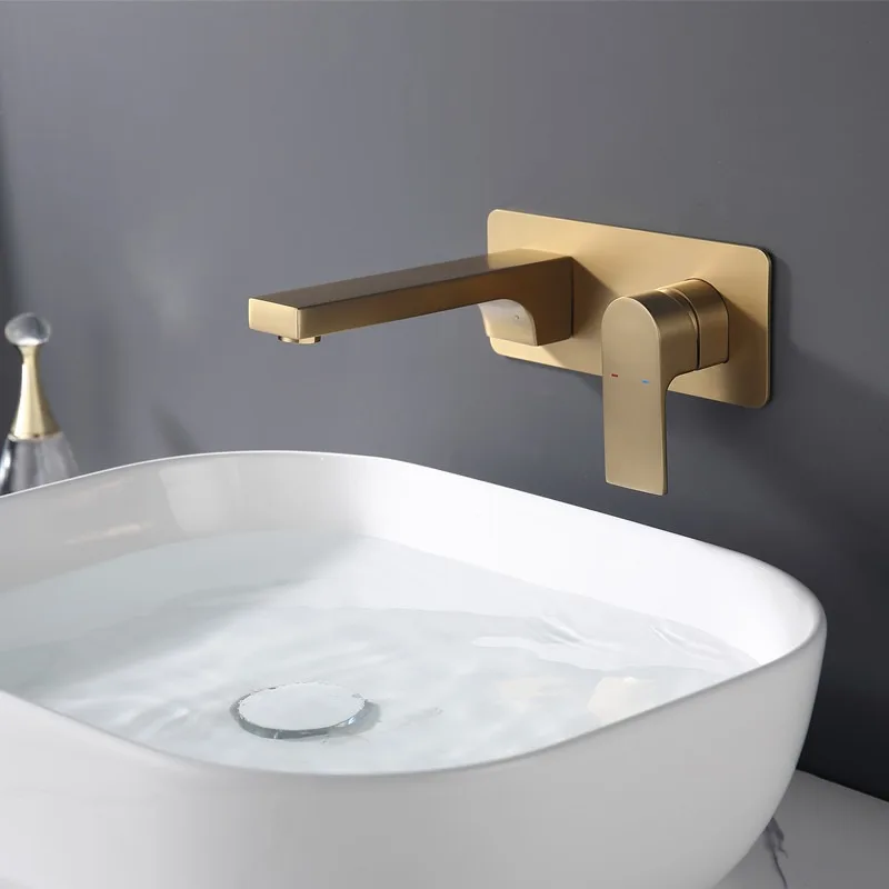 

Настенный смеситель для раковины с горячей и холодной водой, изготовленный из цельной латуни, встраиваемый в стене, отделка матовым золотом.