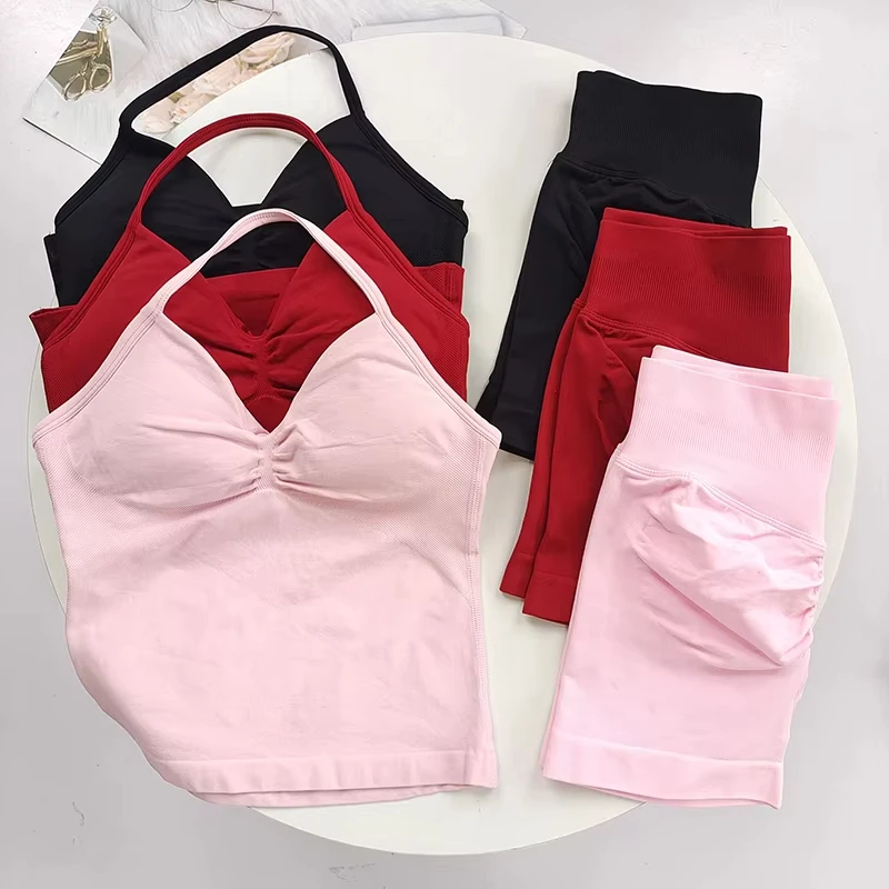 

Женский комплект для йоги с длинной подвеской на спине, европейский и американский летний спортивный жилет с воротником, шорты с высокими бедрами.