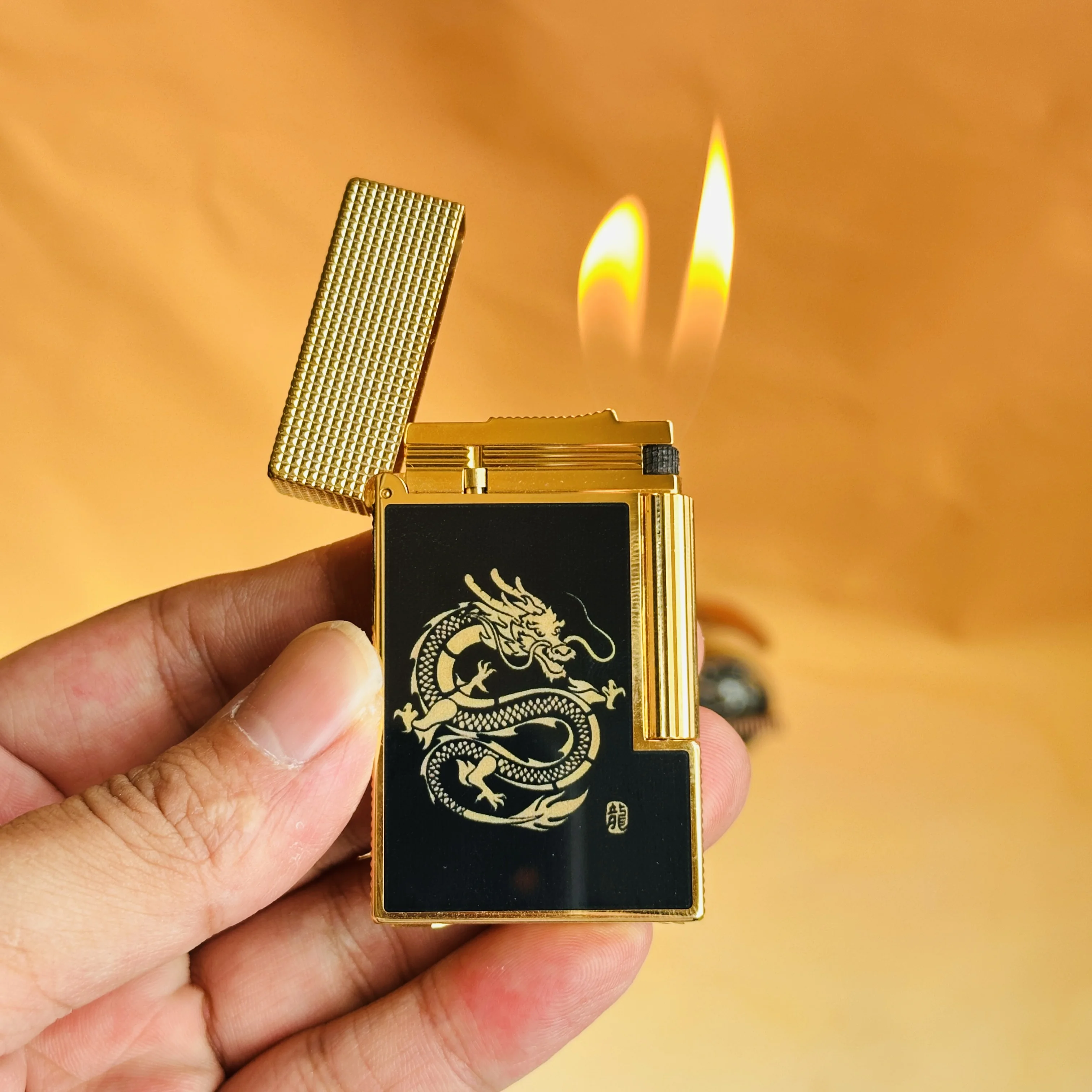 

Custom-designed lighter with a powerful dragon and tiger motif, includes a set of custom-designed smoking accessories.