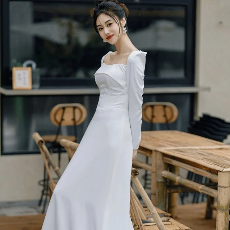 Vestido de novia ligero de satén de manga larga de estilo francés, vestido blanco minimalista de invierno con cola de pez, velo de novia de bienvenida