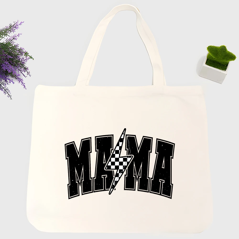 Women's "MAMA" letter print canvas tote bag with checkerboard lightning graphic, casual style for daily shopping and errands