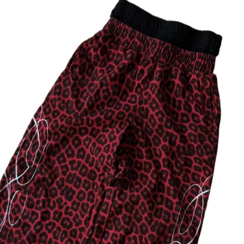 Pantaloni da uomo a doppia vita con stampa leopardata con design hip-hop retrò americano, pantaloni da strada di moda per uomo e donna