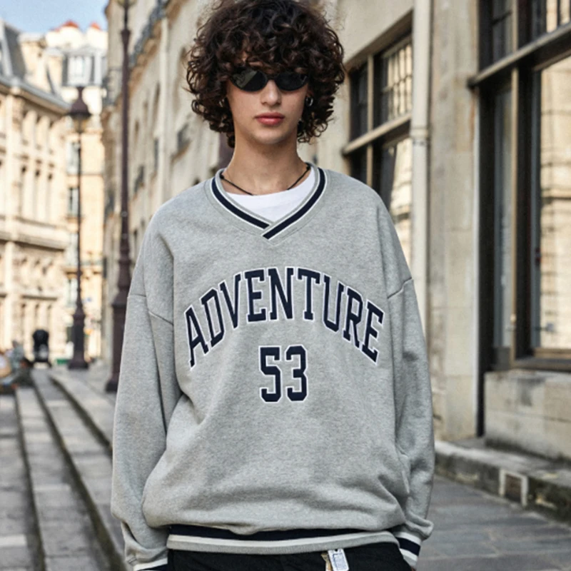 

New V-neck adventure pattern casual loose fashion hoodie factory direct sales autumn and winter season hoodie