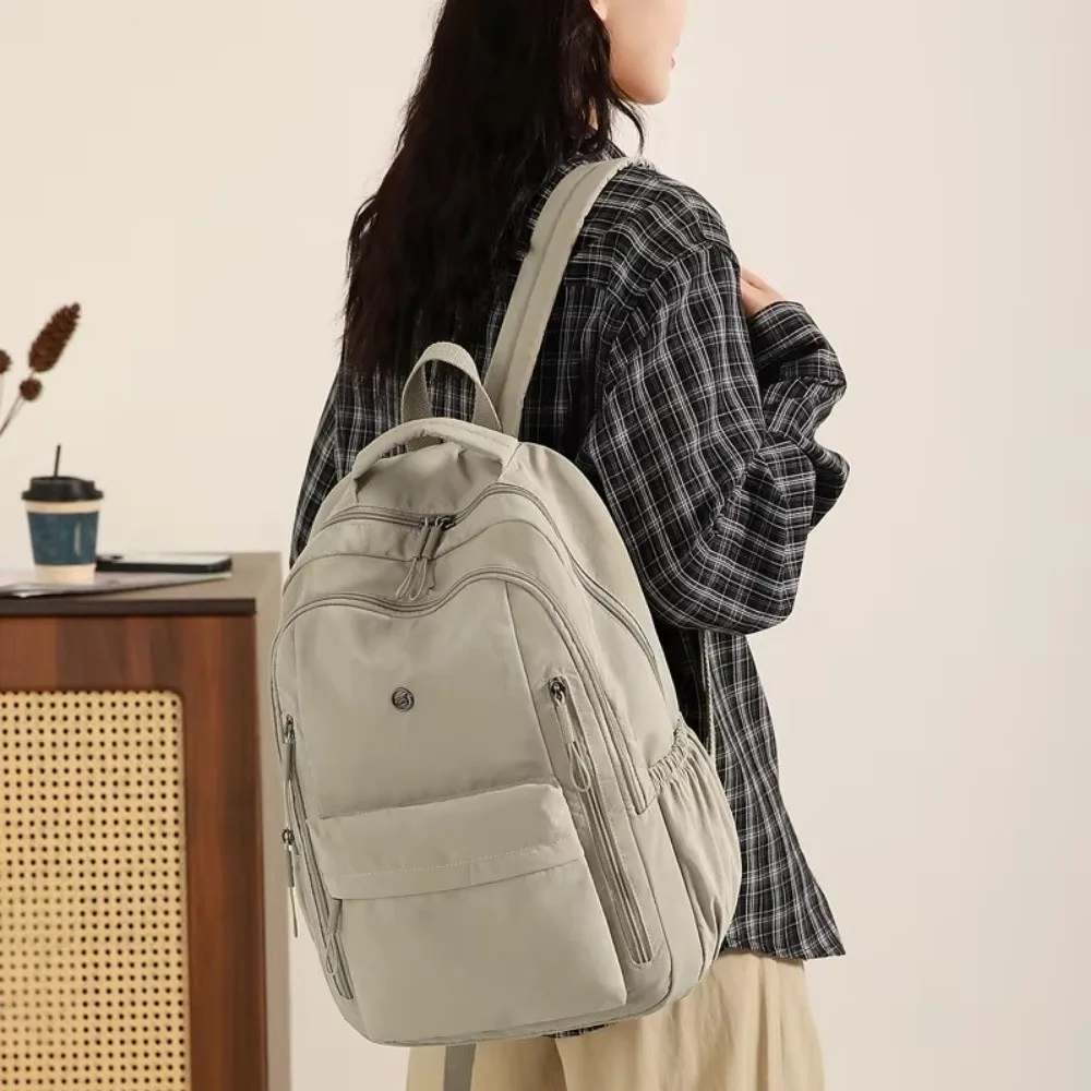 Fashion Large Capacity Women's Backpack Durable Nylon Lightweight School Backpack Multi-Layer Travel Backpack Outdoor Camping