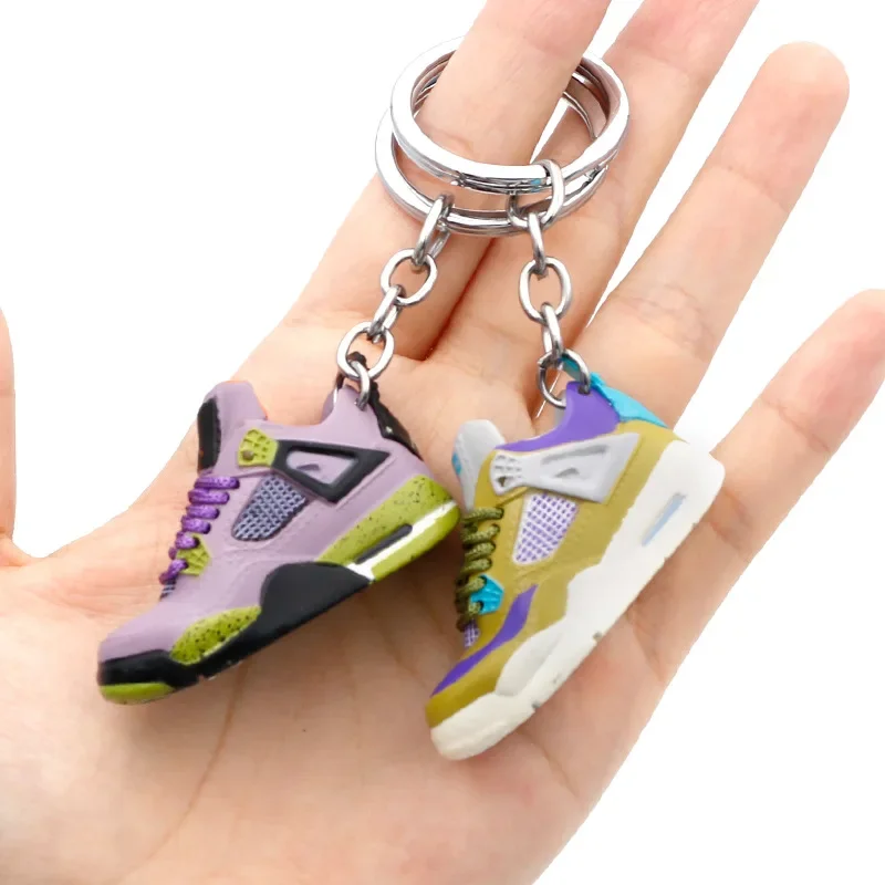 Aj4 white cement blue keychain 3D stereo sneakers pendant four generation model bag jewelry pendant, children's gifts.