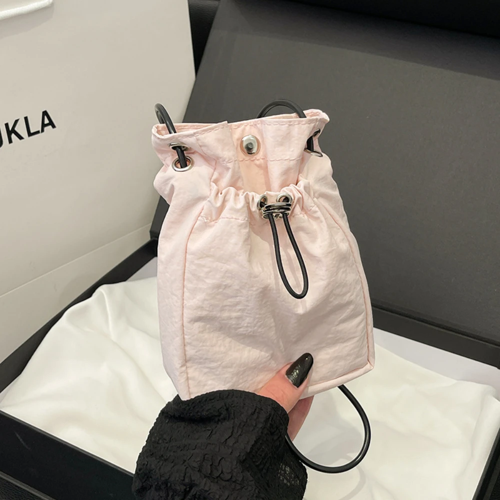 

A small, high-end, lightweight mini bag with a Japanese and Korean artistic single-shoulder crossbody style