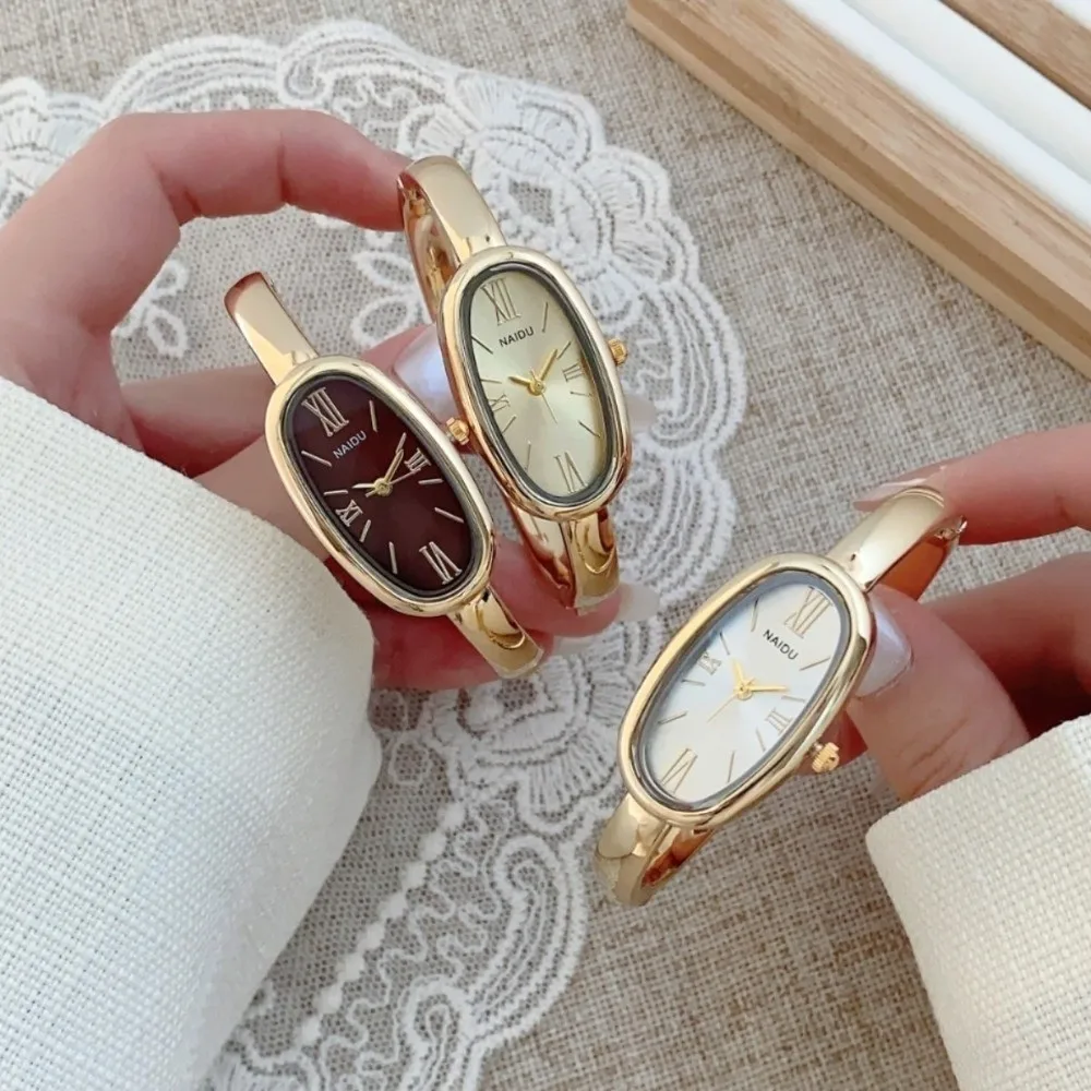 

Lightweight Luxury Bracelet Watch Elegant Gold/Silver Wristwatch Roman Dial Oval Dial Quartz Watch for Women