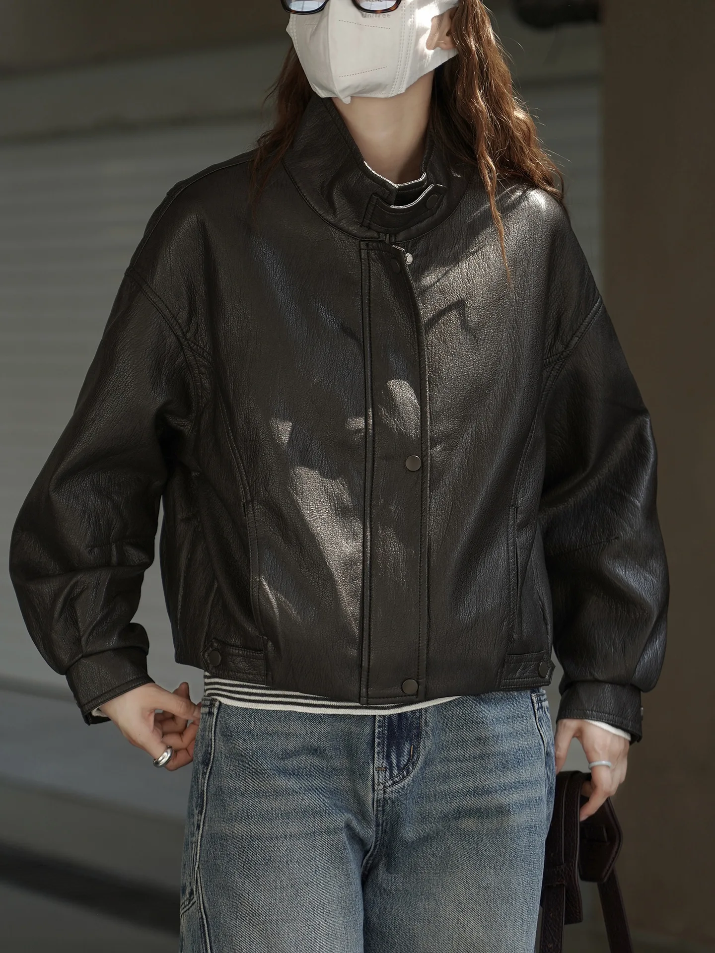 

Fashionable and cool stand up collar split short jacket with a stylish silhouette design for women