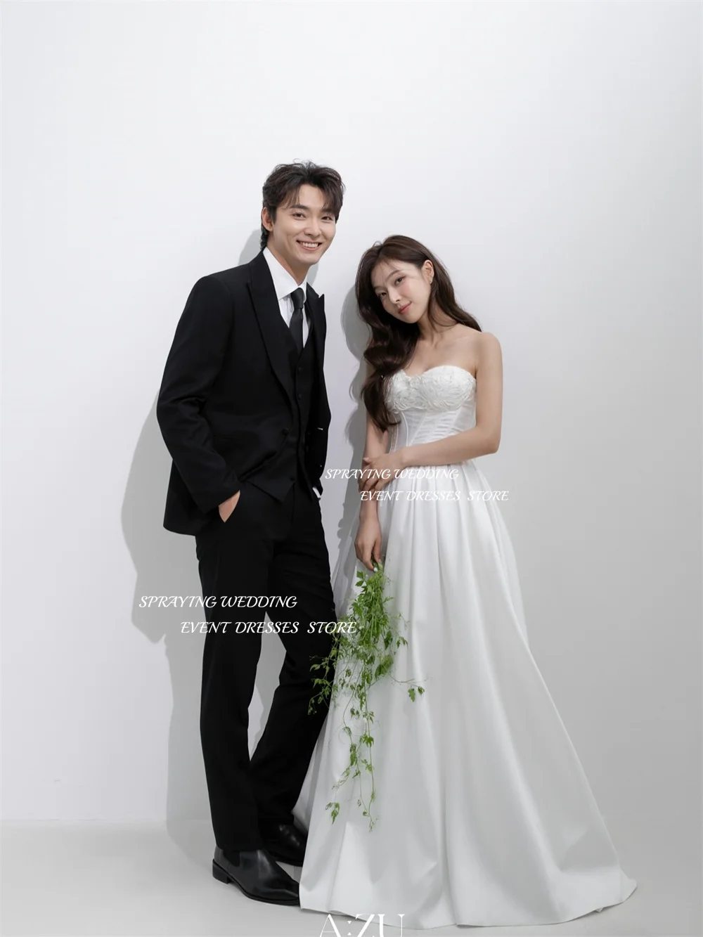 رش فستان زفاف أنيق من الساتان العاجي كوريا صورة تبادل لاطلاق النار على شكل قلب بدون أكمام خط طويل زي العرائس مشد مخصص