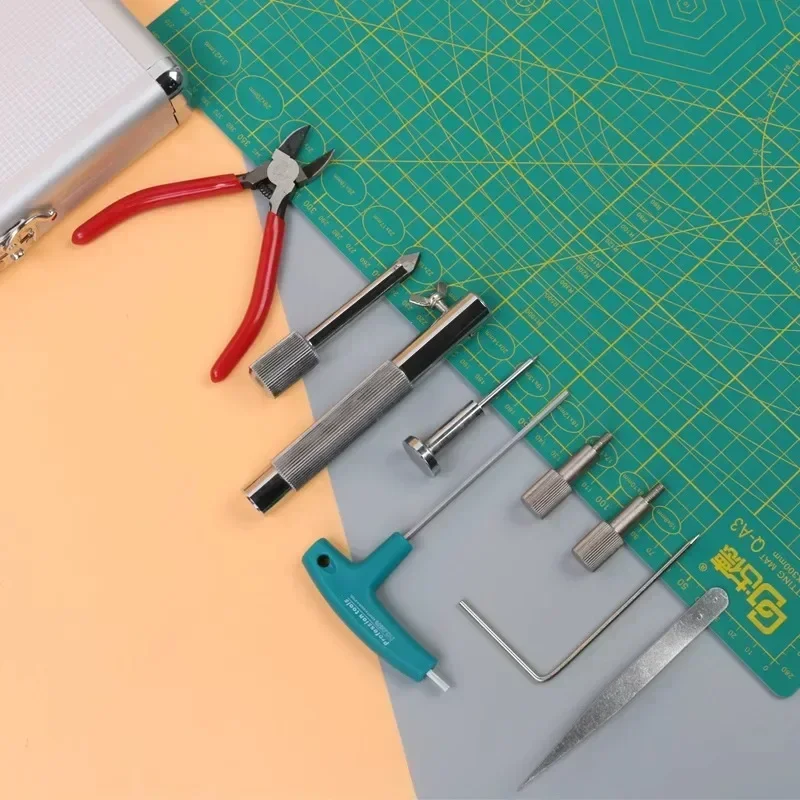 Includes: tube-piercing needle, scissors, pliers, screws, L-shaped fixture, electric riveting/binding machine, and tool case.