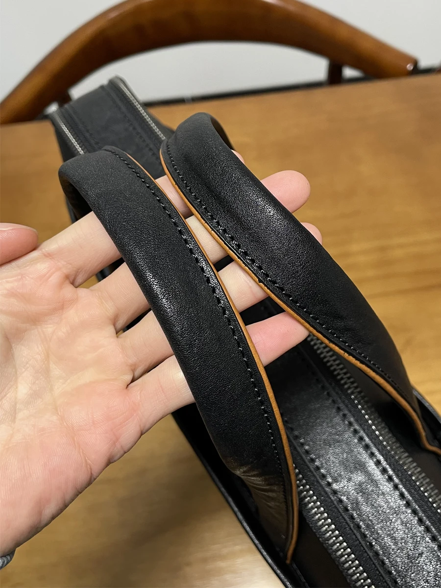 Semplice e casual in pelle bovina conciata al vegetale da uomo e da donna, valigetta nera da viaggio d'affari, borsa per laptop da 15 pollici in vera pelle di lusso
