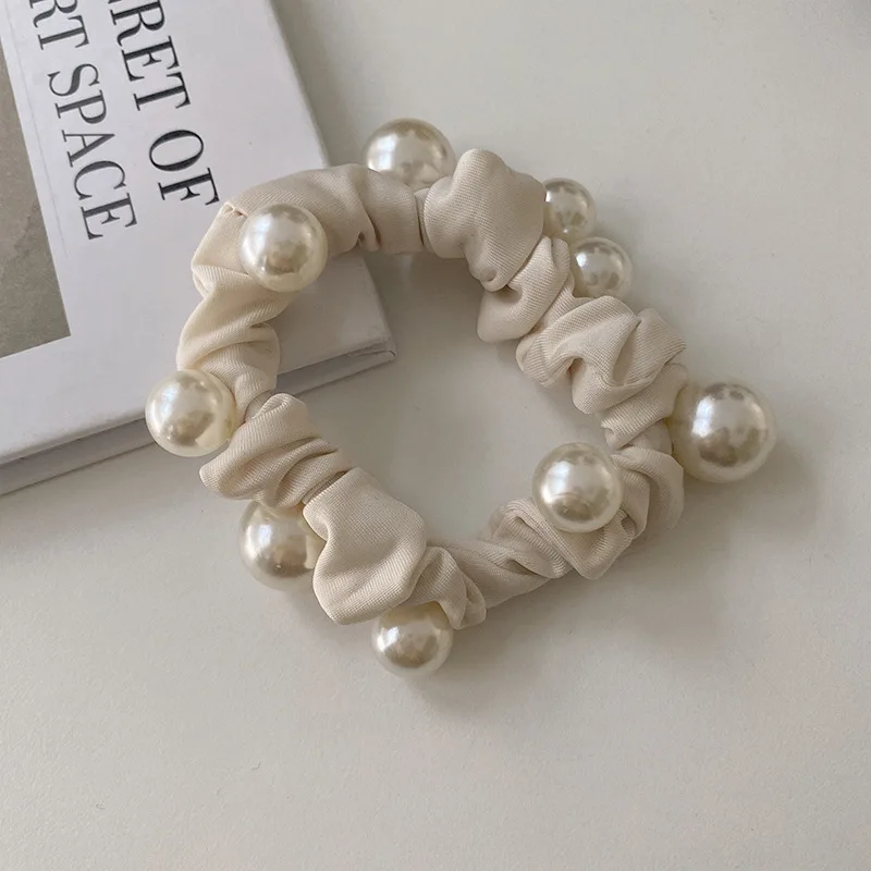 Simple and elegant pearl hair ring Korean version of the head rope women\'s new temperament ball hair accessories rubber band