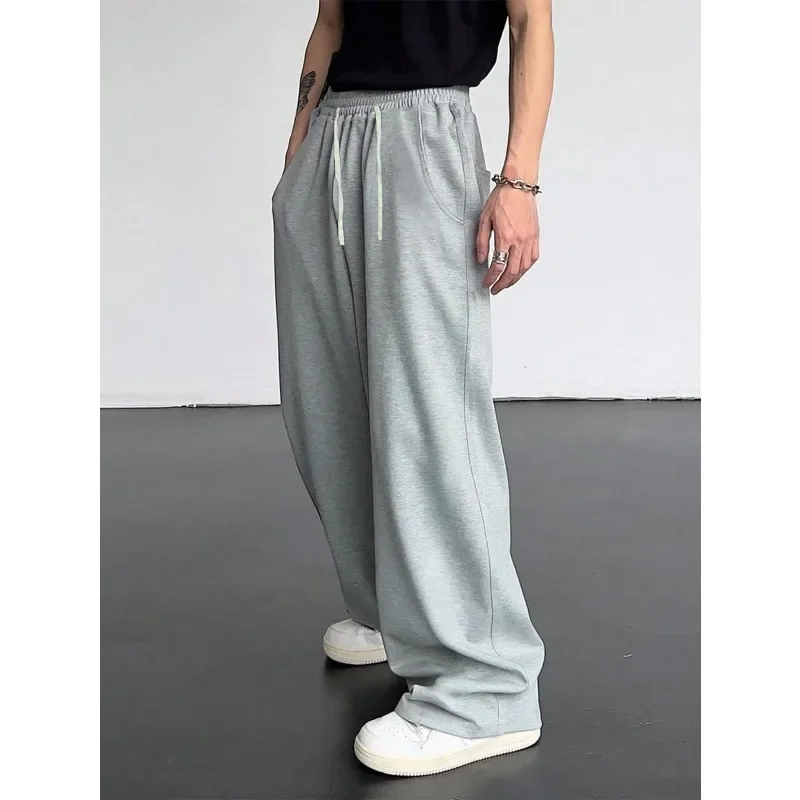 Pantalones deportivos con bolsillo inclinado y cintura con cordón de color sólido para hombre, pantalones sueltos informales de algodón puro, pantalones de chándal para hombre