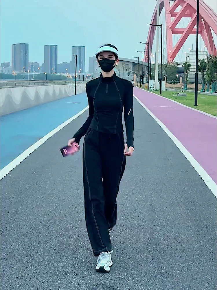 

Элитный спортивный костюм в европейском стиле для женщин: приталенный топ с длинным рукавом и широкие брюки, комплект из двух предметов, черный