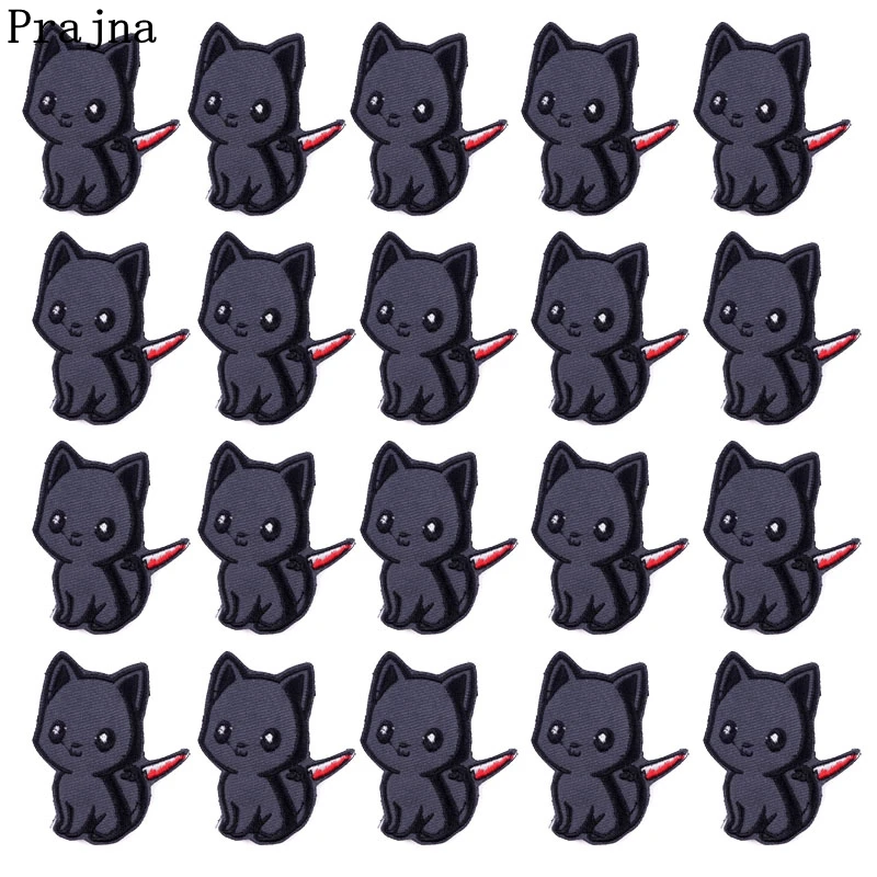 Parche bordado con gato de dibujo animado y cuchillo - plancha