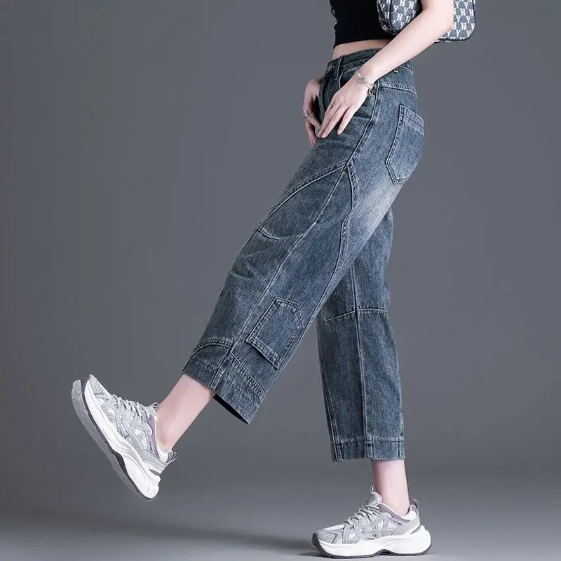 กางเกงยีนส์ทรงหลวมเอวสูง แฟชั่นทันสมัย ช่วยให้ดูผอมเพรียว เรียบง่าย ใช้งานได้หลากหลาย สไตล์เรโทร แต่งผ้าแบบปะติด ทรงขาบานกว้างแบบมีรอยตัดโค้งมน