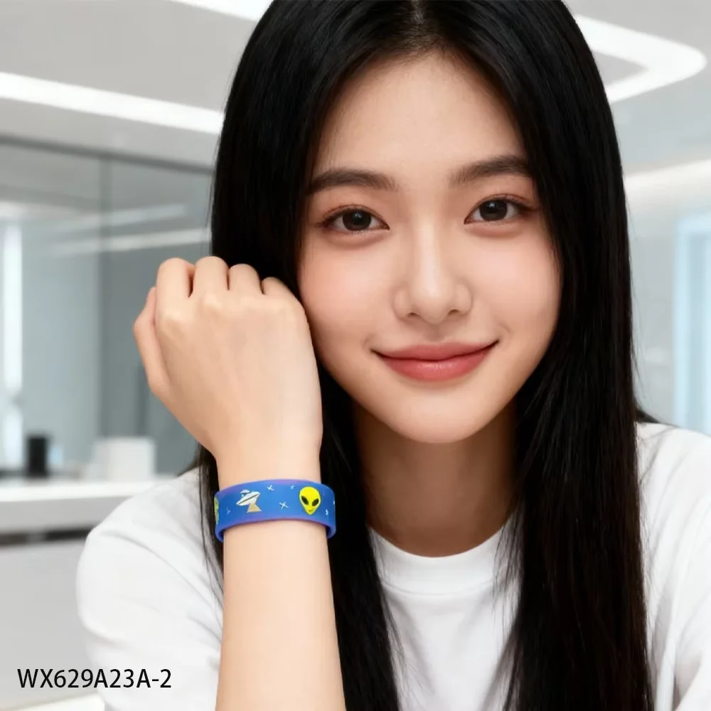 

PESENAR This blue and purple gradient bracelet decorated with aliens and satellites is a perfect match for the alien party