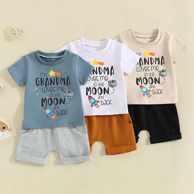 

2024-04-03 lioraitiin Toddler Boys Summer Outfit Letter Rocket Print Short Sleeve T-Shirts Tops Elastic Waist Shorts Clothes Set