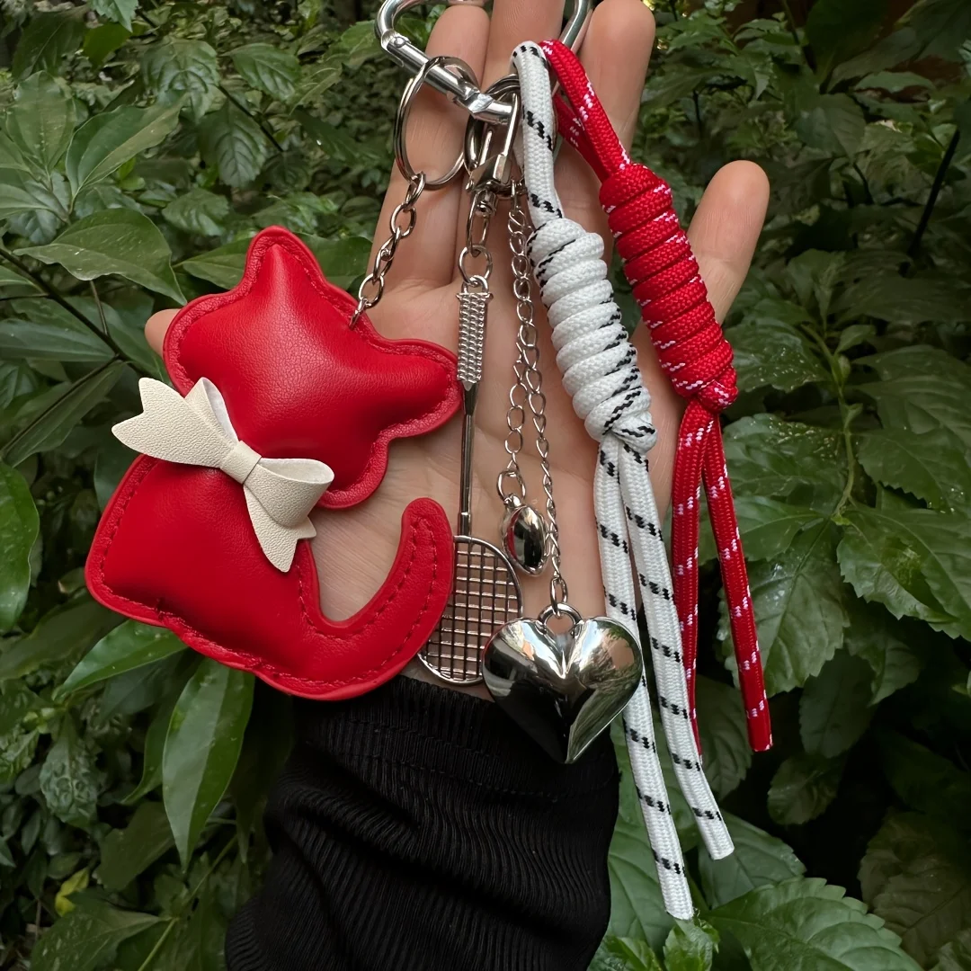 

Высококачественный кожаный брелок для ключей в виде кошки, легкий, многофункциональный, подвеска для багажа, кисточка, подвеска для рюкзака в форме сердца, аксессуары для подарков