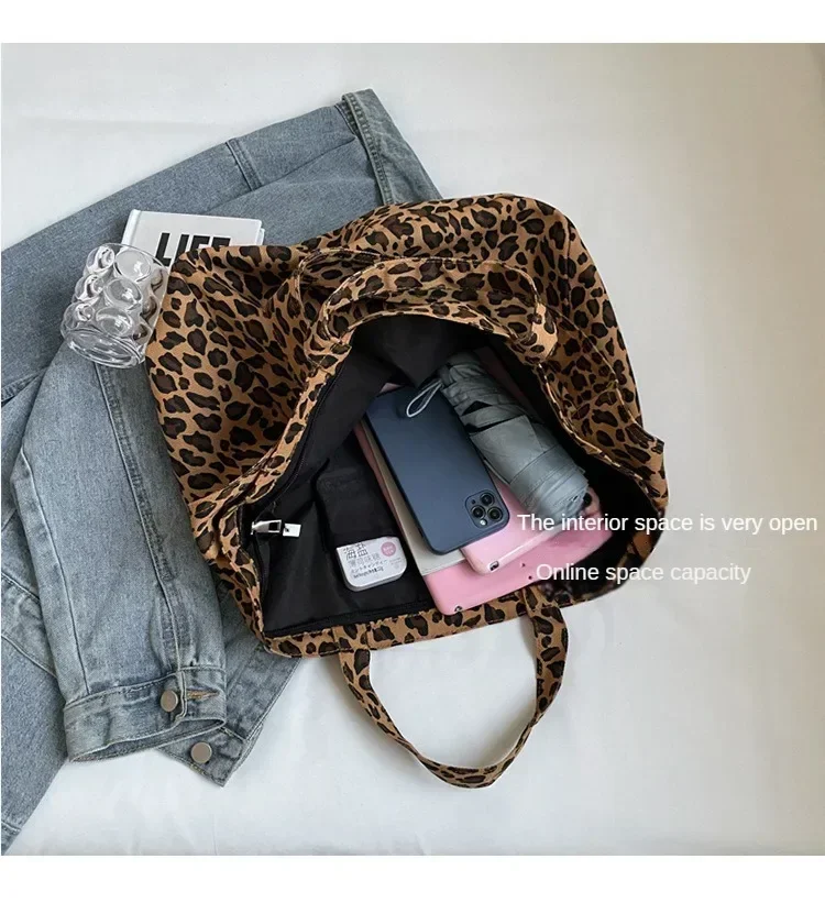 Roomy interior of the oversized leopard print bag