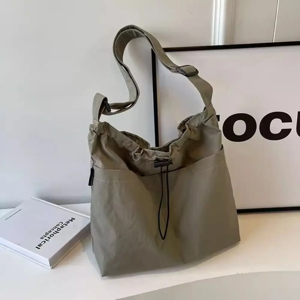 

Fashionable Korean Style Drawstring Bucket Bag Large Capacity Crossbody Bag Nylon Shoulder Bag Solid Color Tote Bag Travel