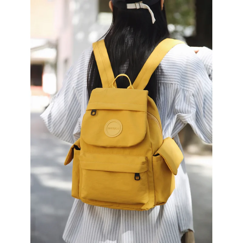 

Women's outdoor backpack with large capacity, multiple compartments, and lightweight design for commuting14Laptop bag, school ba