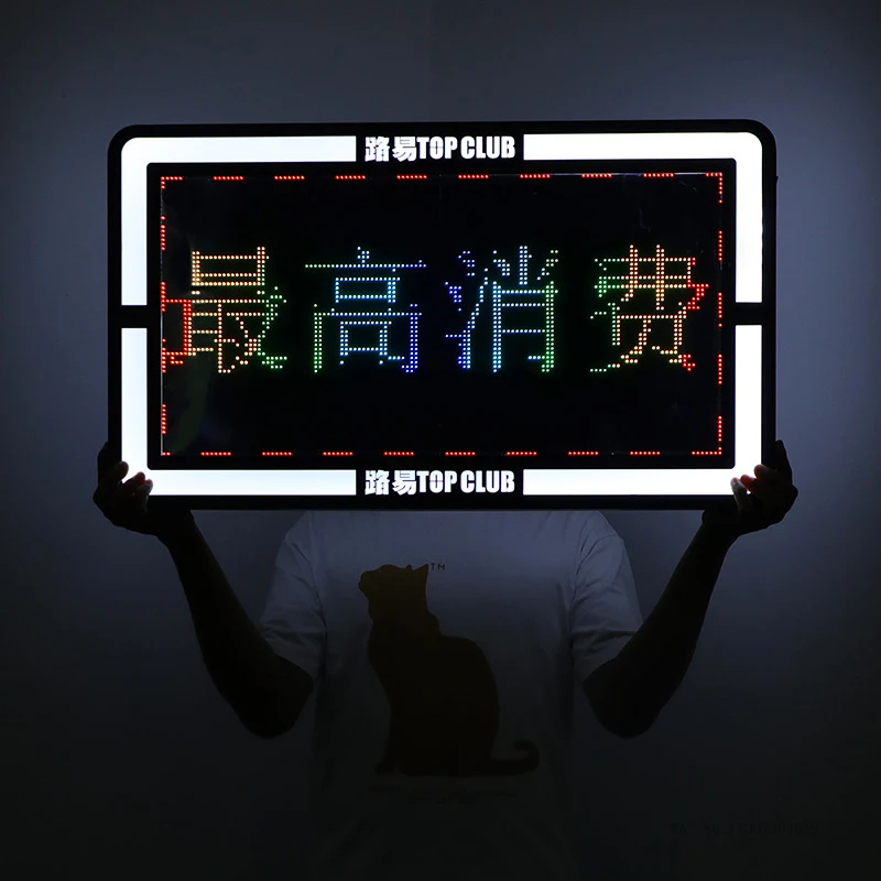 BarKTVNightclub bartender holding a signAPPChange the wordLEDIlluminated screen with colorful scrolling text square billboard