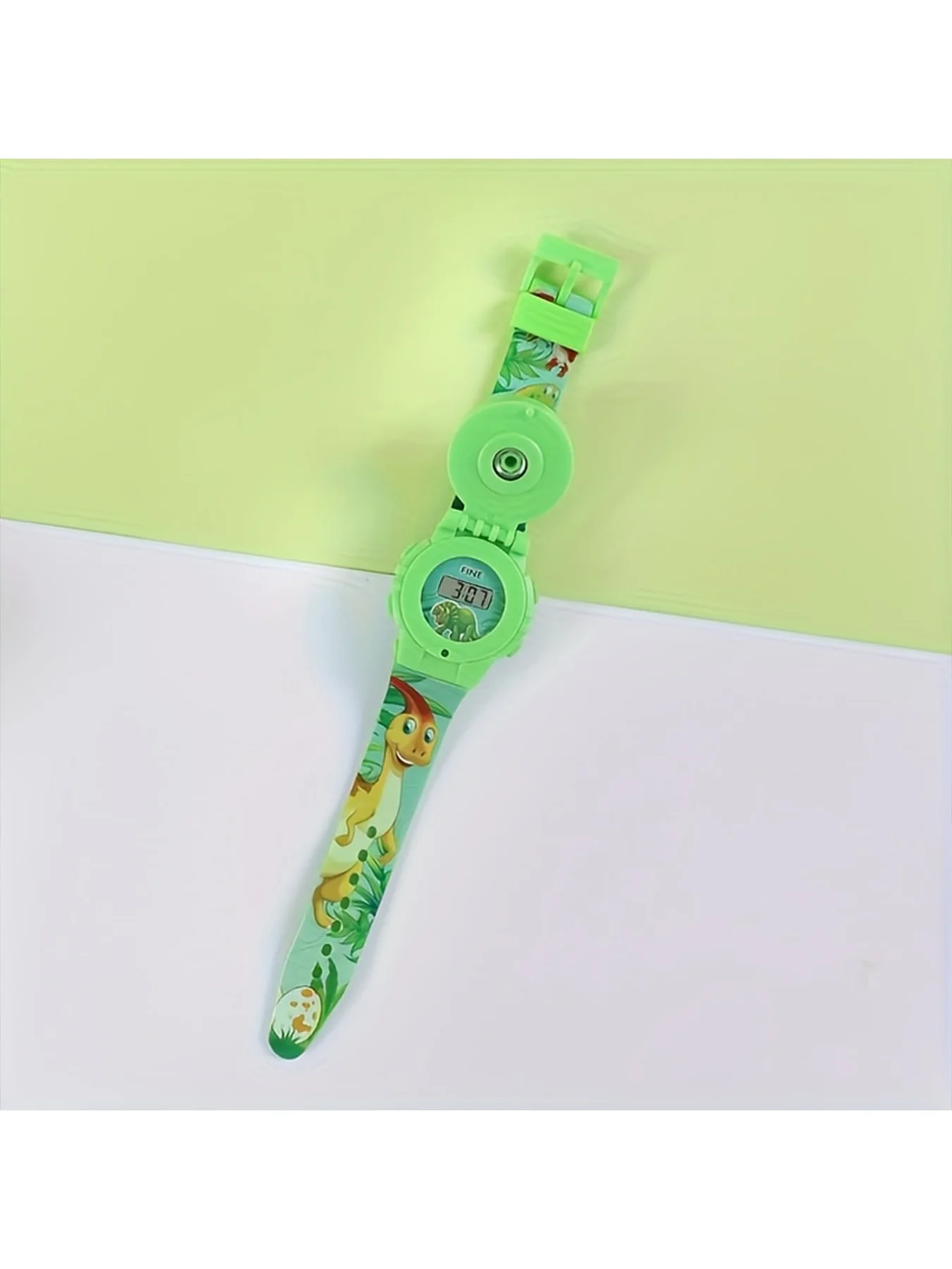 Fotografia 5: Relógio eletrônico com design de dinossauro de desenho animado, novo, combinando diversão e praticidade, adequado para uso diário. Adota uma tecnologia rotativa.
