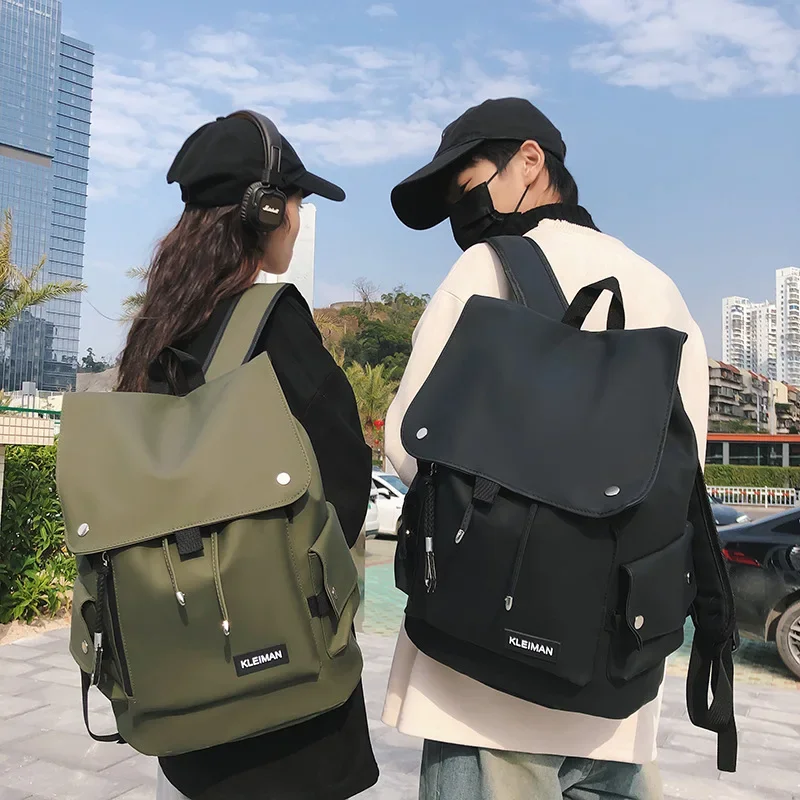 Men's and women's backpacks wholesale anti-splashing locomotive large capacity large cover student schoolbag new backpack