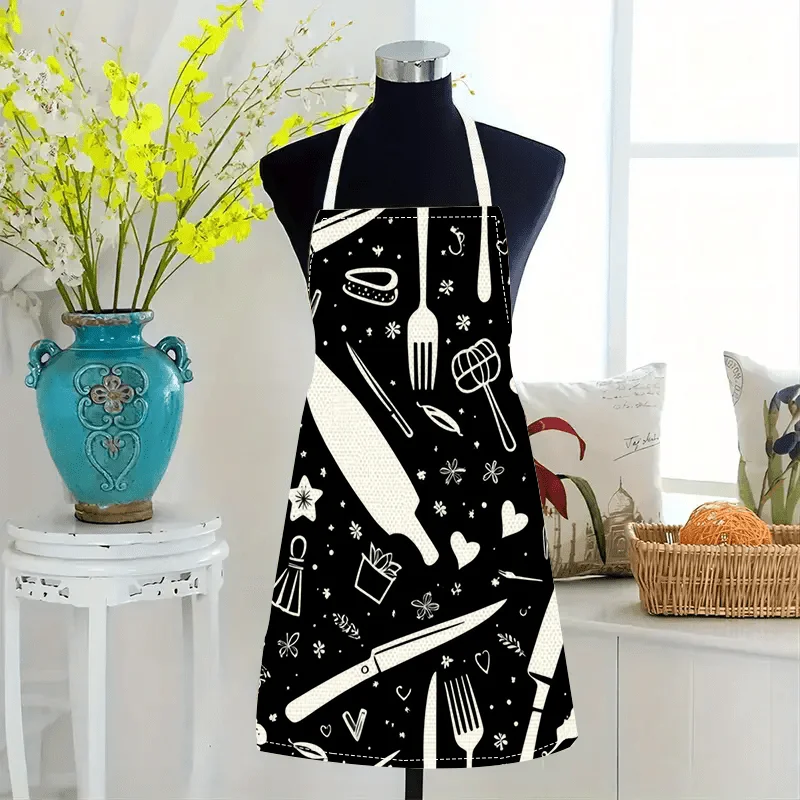 

Black Linen Apron with White Kitchen Tool Print – Minimalist utensil pattern, sleeveless, durable & machine-washable for cooking