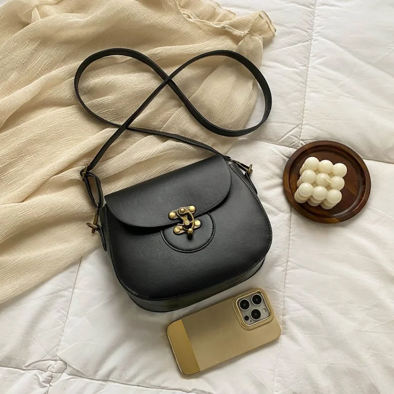 

Elegant Crescent Moon Bag For Women With Unique Curved Design And High Gloss Leather Finish