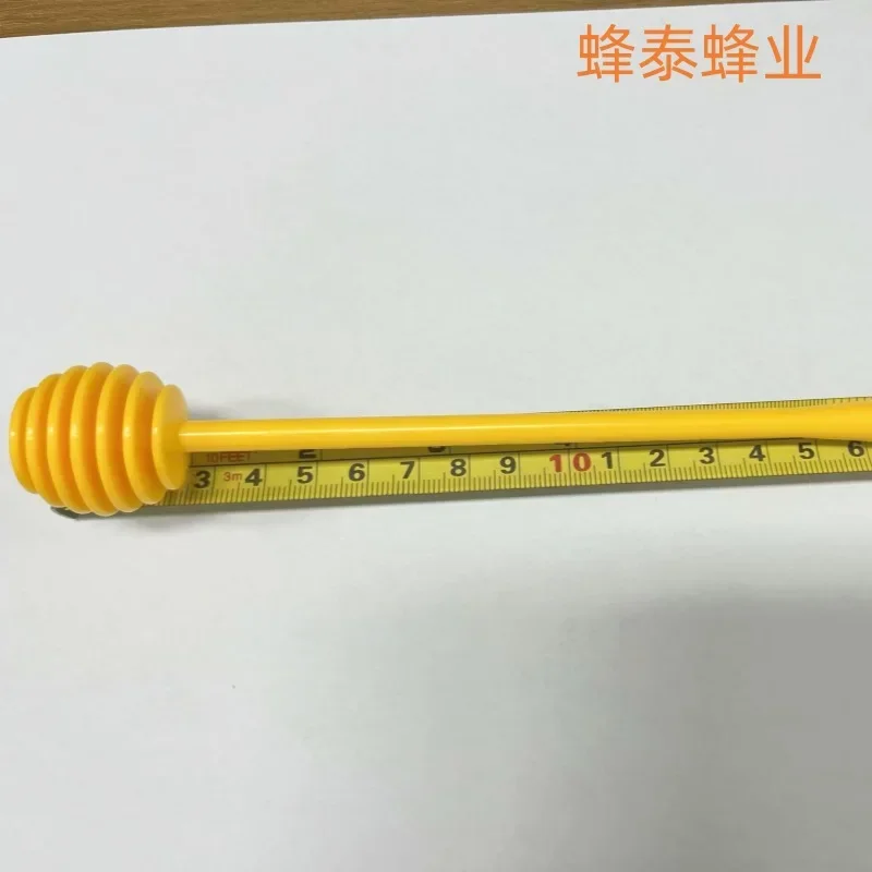 A 20PCS Honey extractor, mixing stick, plastic honey extractor