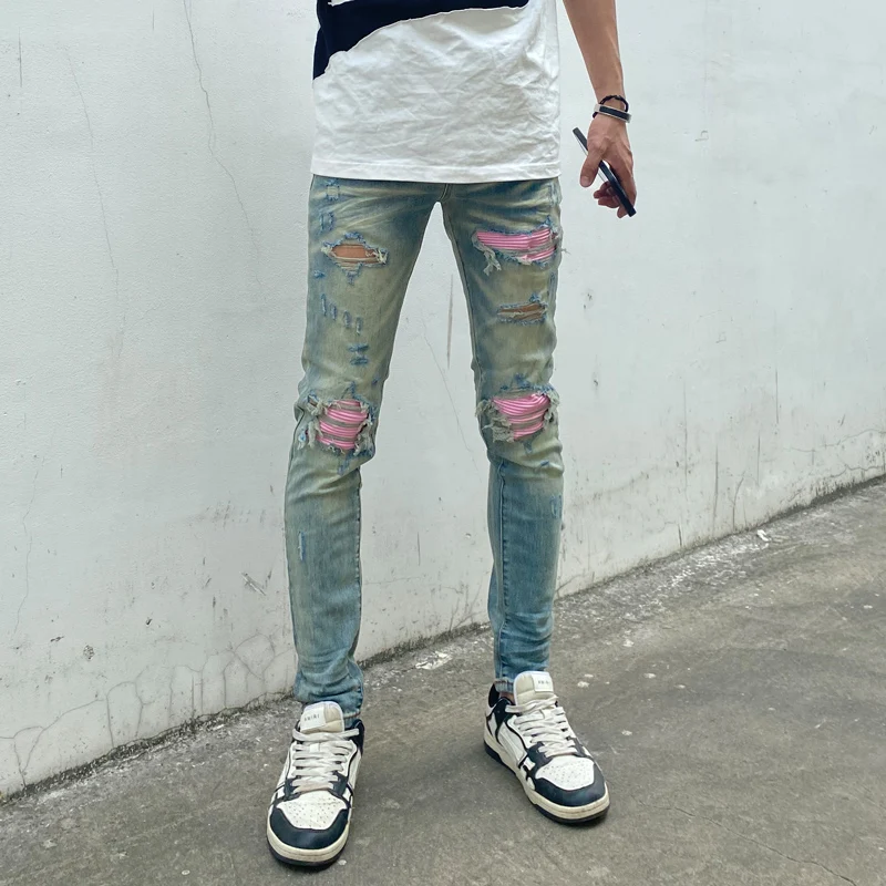 

Street fashion new men's jeans pleated nostalgic washed elastic slim fit perforated red skin patch light blue jeans designer hip