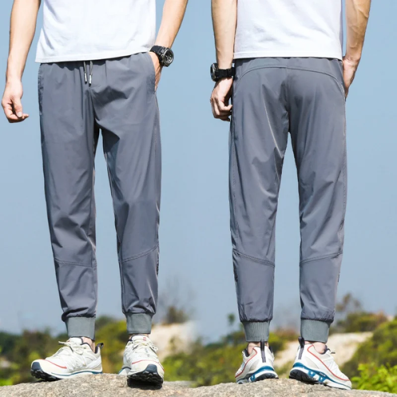 Pantaloni estivi sottili ad asciugatura rapida da uomo 2024 nuovi vestiti da uomo all'aperto Stretch pantaloni da arrampicata sportivi ricamati alla moda traspiranti