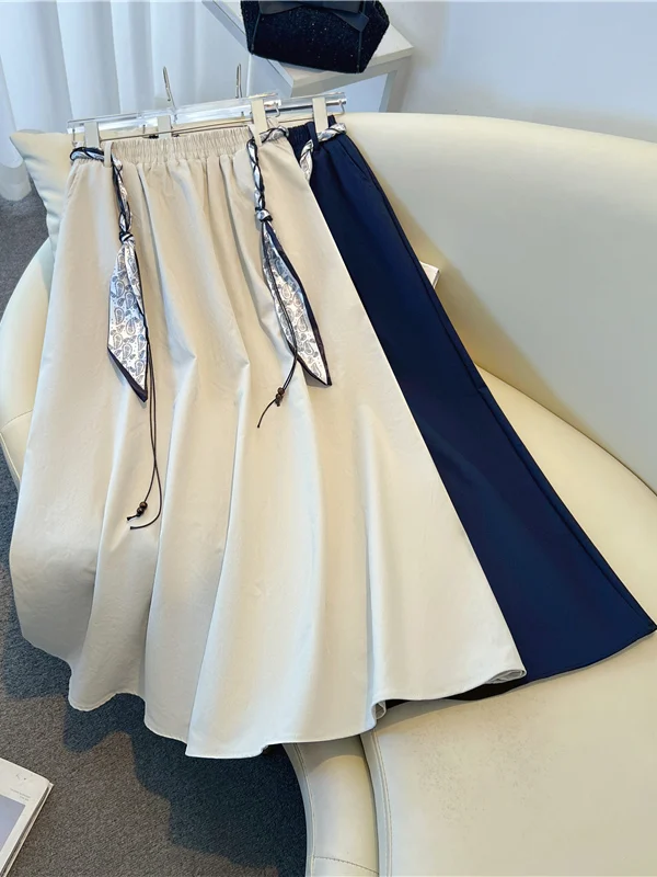 

Женская джинсовая юбка с мягким шелковым поясом больших размеров, длинная юбка трапециевидной формы с высокой талией, повседневная осенняя юбка-стойка...