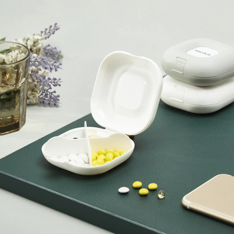 Mini portatile moderno con corda sospesa Mini scomparto anti smarrimento Scatola di immagazzinaggio sigillata a ribaltamento Scatola di immagazzinaggio per medicinali di grande capacità