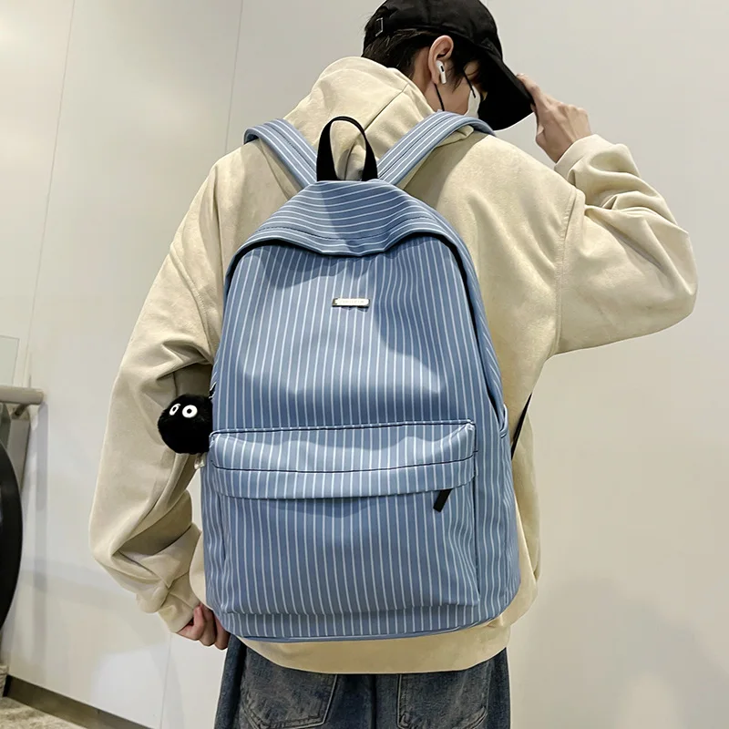 Men Women Blue White Striped Backpack Casual Lightweight School Bag With Plush Coal Ball Pendant For Students